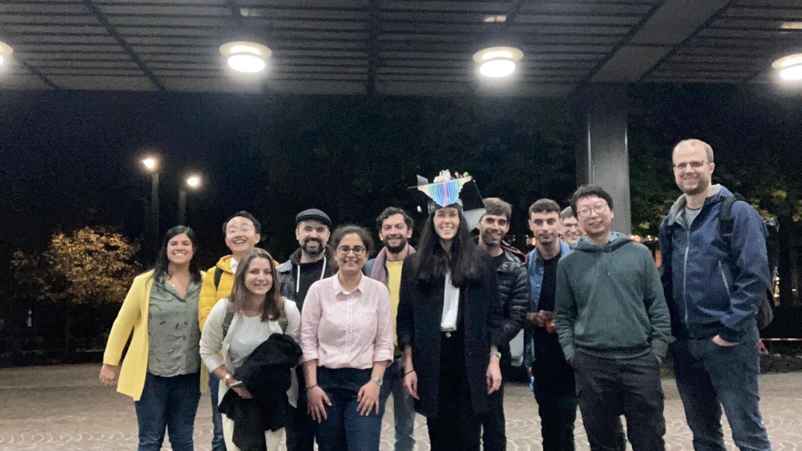 A coronated Dr. Aguzzi surrounded by her colleagues from the Chair of Structural Mechanics and Monitoring